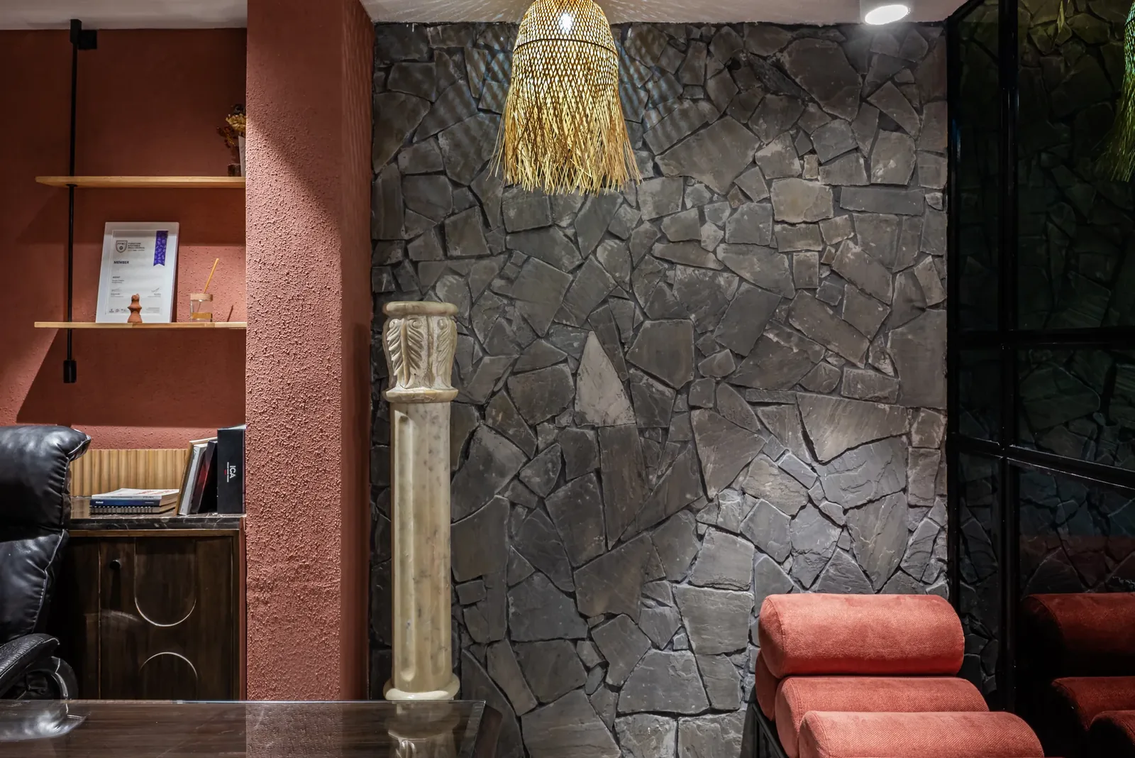 Stone feature wall with a single triangular stone